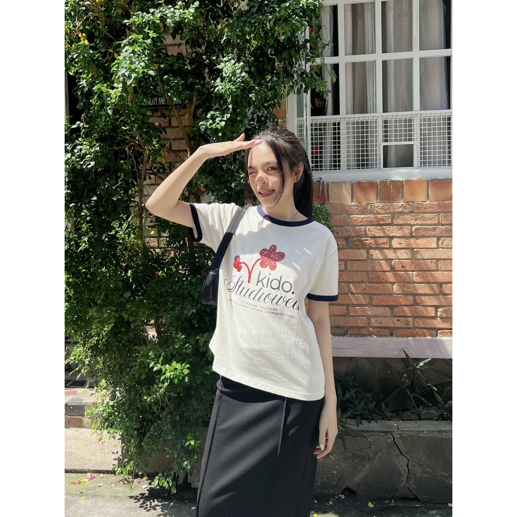 Áo thun tay ngắn cổ tròn in chữ KIDOSTUDIOWEAR