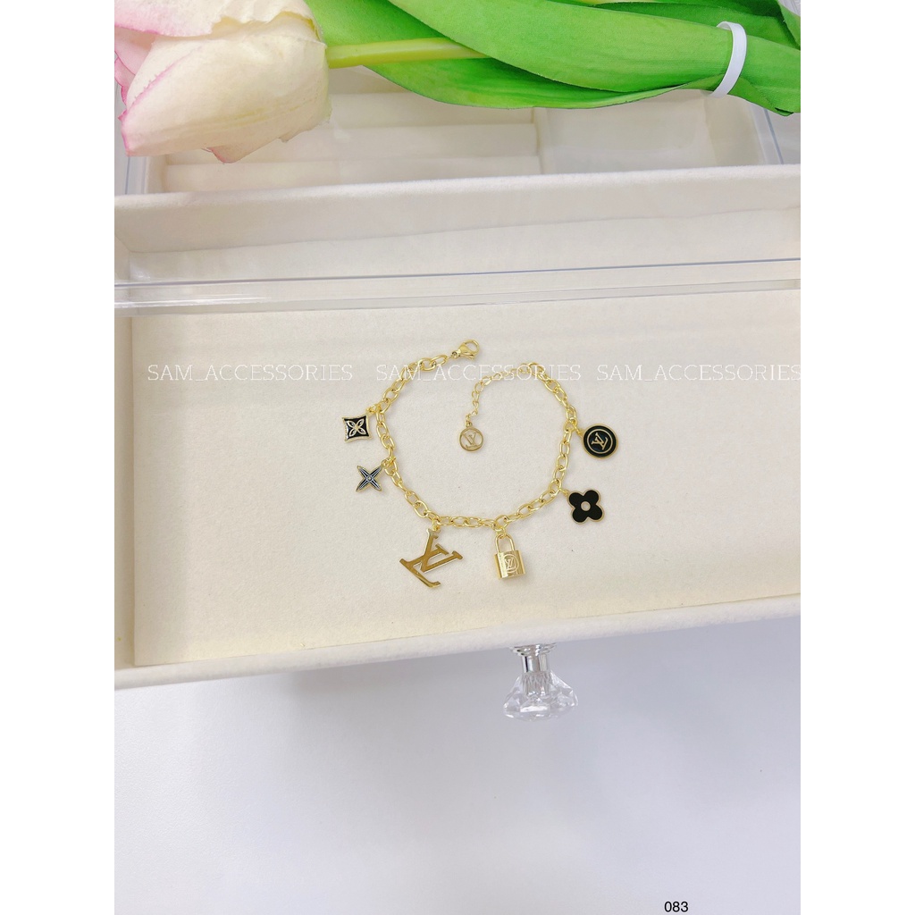 Lắc tay titan hoa đen khóa Lệ Vi