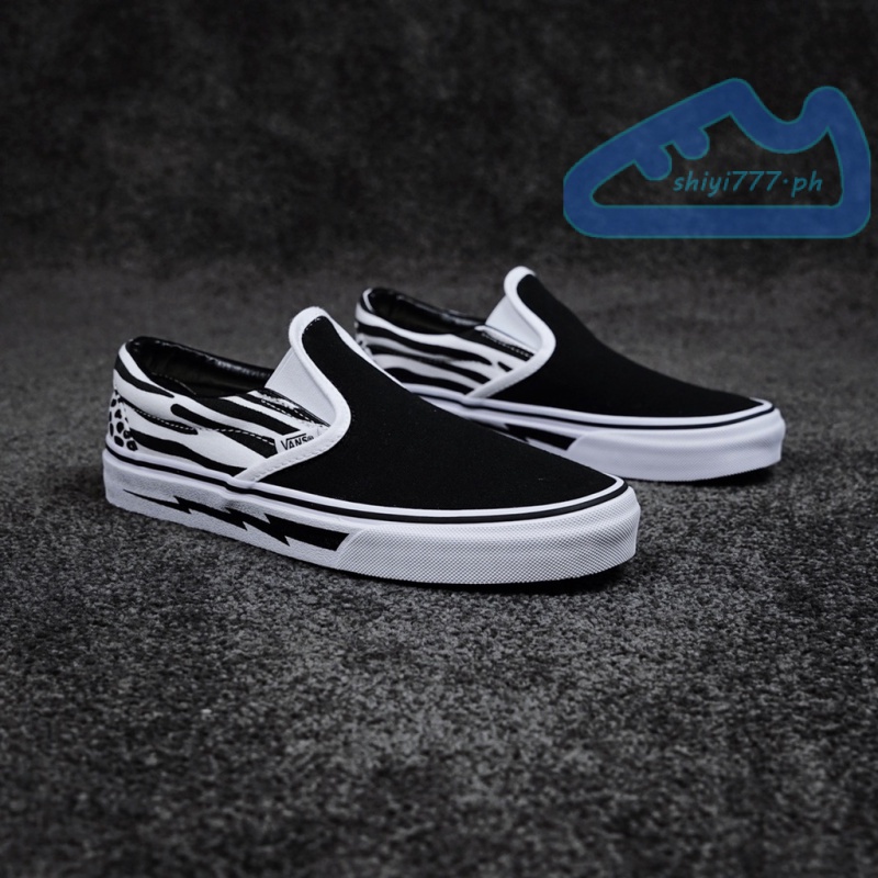 Giày Lười Vải canvas Cổ Thấp Họa Tiết Chấm Bi / Ngựa Vằn / Sấm Sét Trắng Đen Thương Hiệu Vans