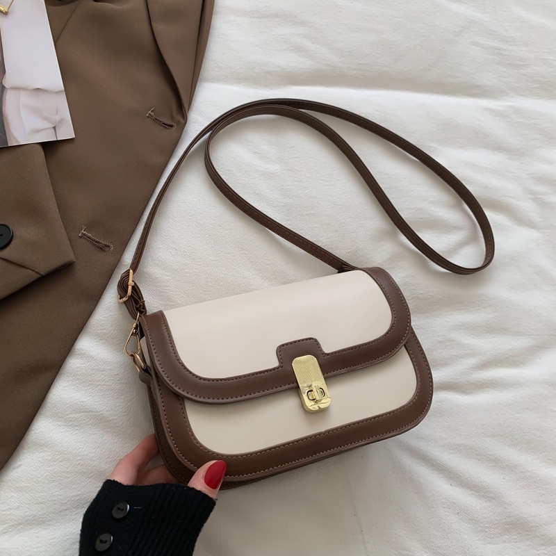 Túi xách nữ đeo chéo phong cách nữ tính thanh lịch khóa xoay có hai màu đen và trắng nâu