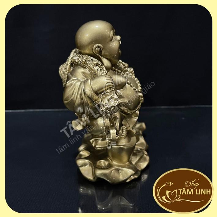 Tượng phật Di Lặc kéo tiền trên bao tải - tamlinhvanhoaphamphatgiao