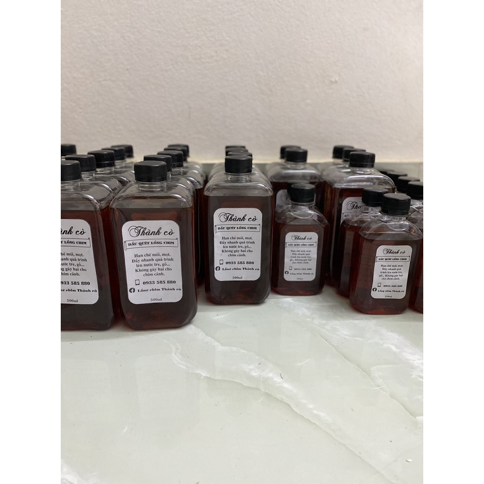 Dầu Quét Lồng Chim Thành cò chai 500ml