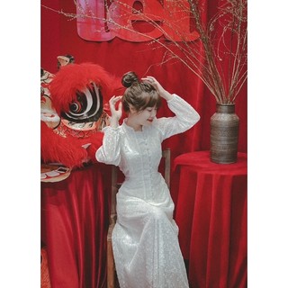 Đầm trắng cổ trụ