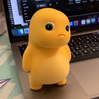 Đồ Chơi Nắn Bóp Đàn Hồi Giảm Stress Hình Khủng Long Màu Vàng Dễ Thương