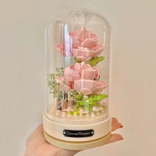 Khối đồng hồ xoay hộp nhạc khối chuông hoa hồng phong lan giáo dục lắp ráp bộ đồ chơi lắp ráp