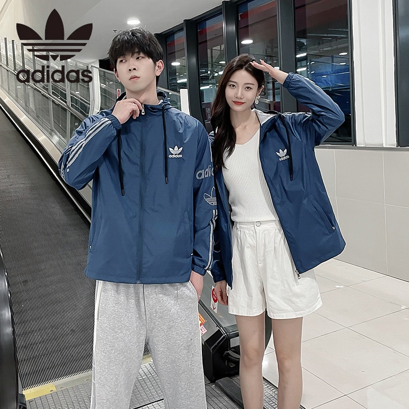 Áo Khoác Gió Adidas 100% Vải Mỏng Có Mũ Trùm Thêu Logo Cá Tính Cho Nam Và Nữ
