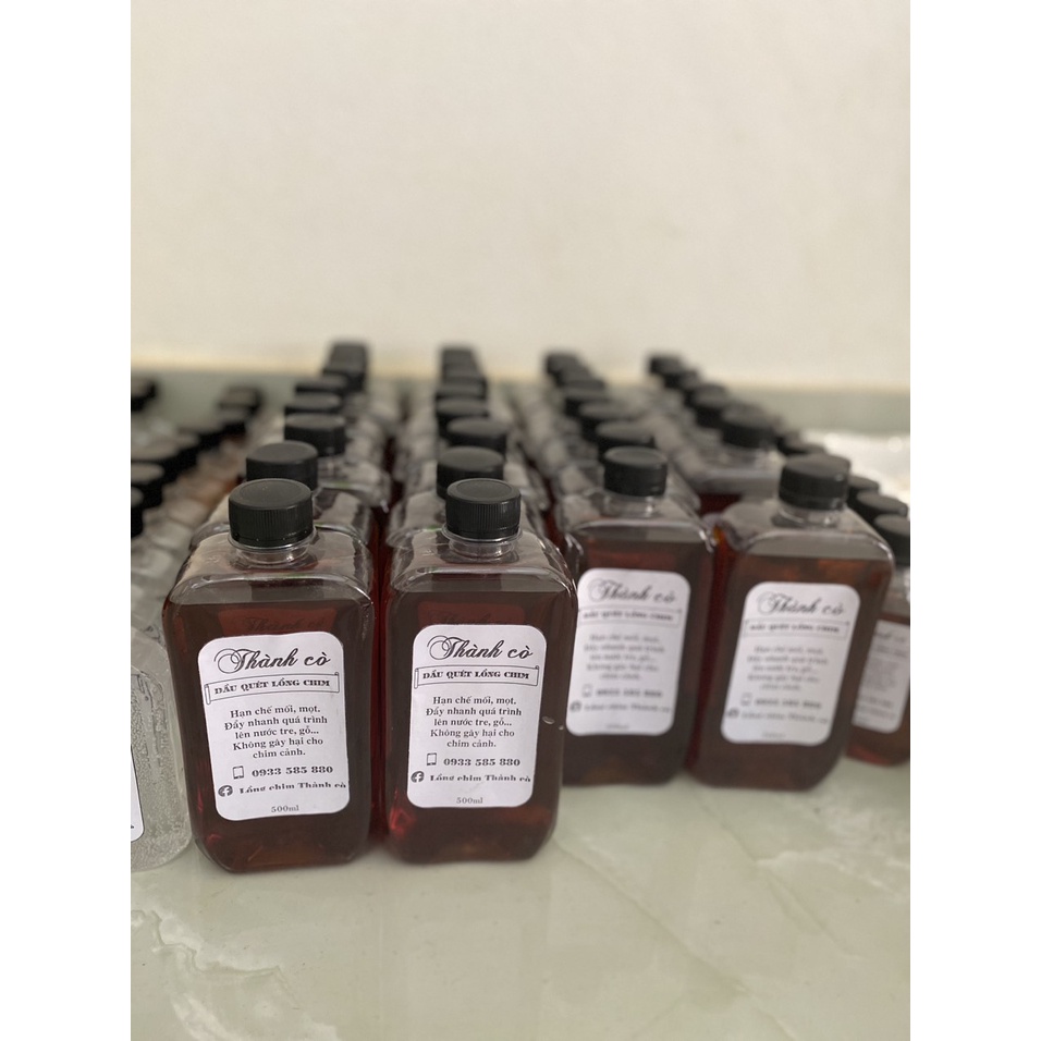 Dầu Quét Lồng Chim Thành cò chai 500ml