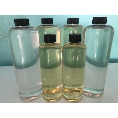 Dầu dừa nguyên chất + Chai lăn - Nấu lửa củi (500ml)