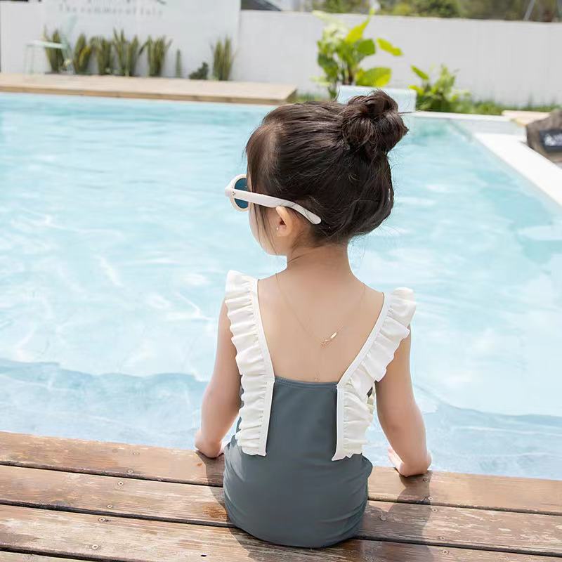 Bộ Đồ Bơi Một Mảnh Phối Ren Thắt Nơ Hở Lưng Nhanh Khô Phong Cách Ngọt Ngào Thời Trang