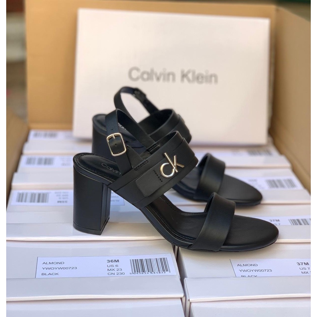 Sandal C.K quai ngang đính logo, gót trụ 7cm