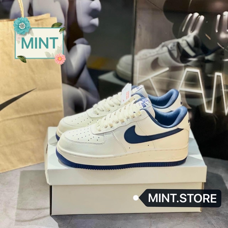 Giày thể thao sneaker kem móc xanh navy