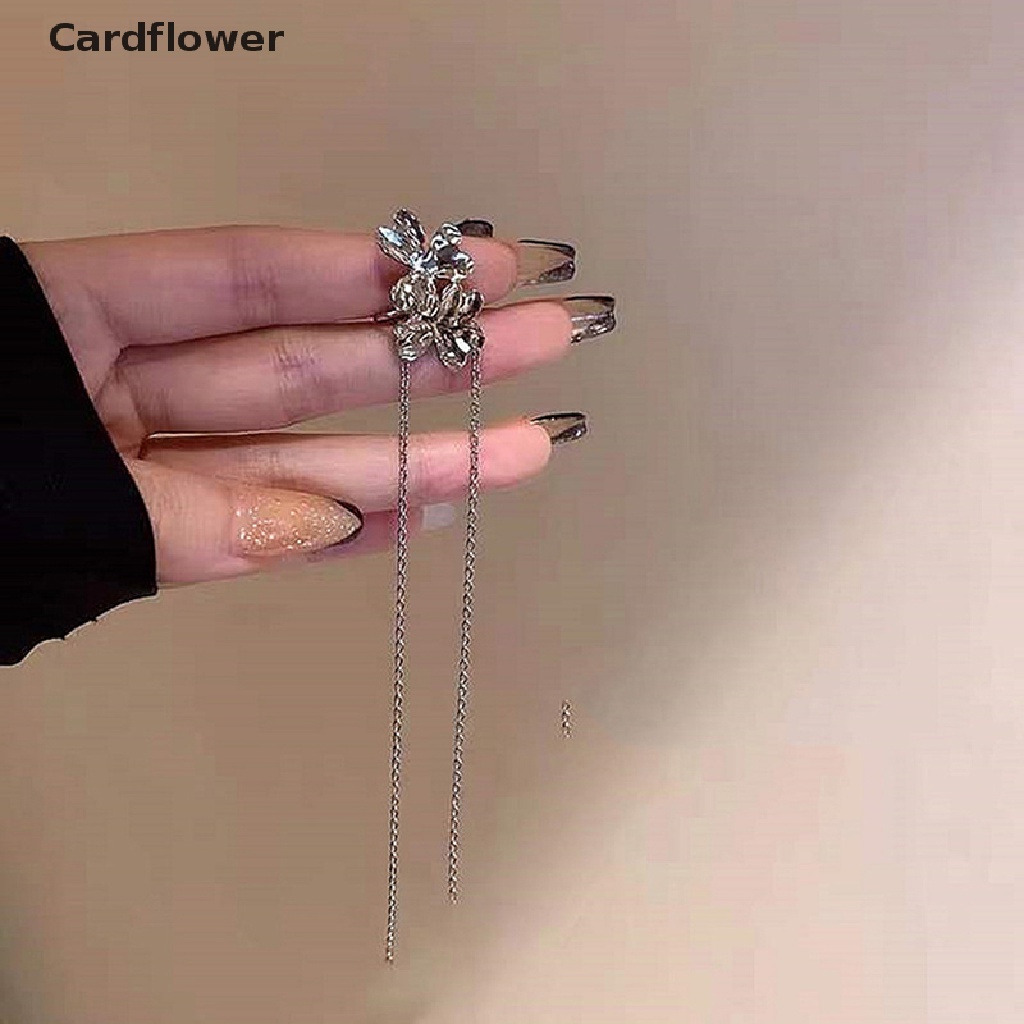 1 Khuyên Kẹp Vành Tai Dáng Dài Hình Hoa Màu Bạc Thời Trang Cho Nữ