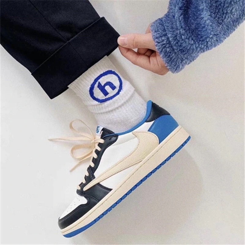 SNEAKERS GIÀY TRAVISS ĐẢO LOGO ĐẾ NGÀ MÀU XANH ĐEN NAM NỮ
