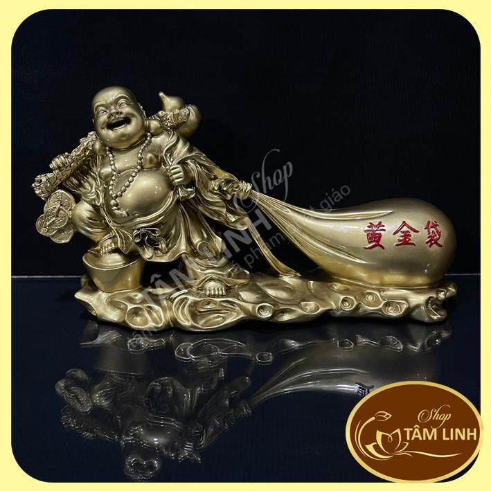 Tượng phật Di Lặc kéo tiền trên bao tải - tamlinhvanhoaphamphatgiao