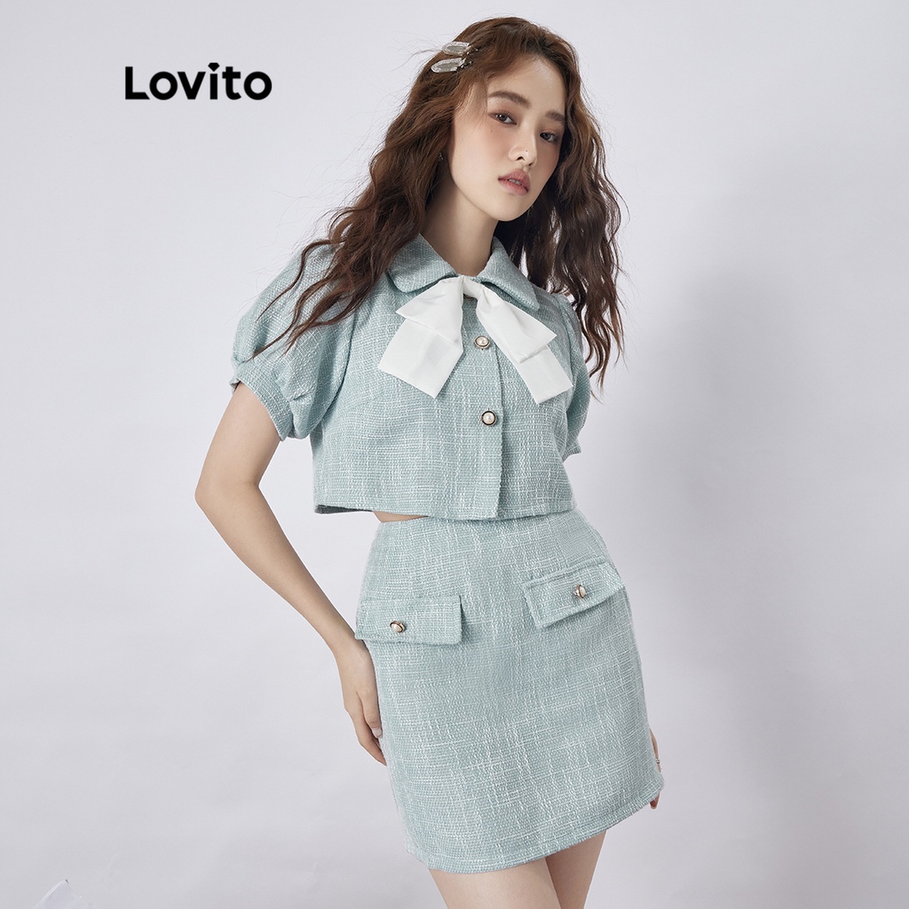 Bộ váy nữ có nút thắt nơ trơn giản dị