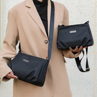 Túi đeo vai màu đen chất liệu nylon chống thấm nước fna317