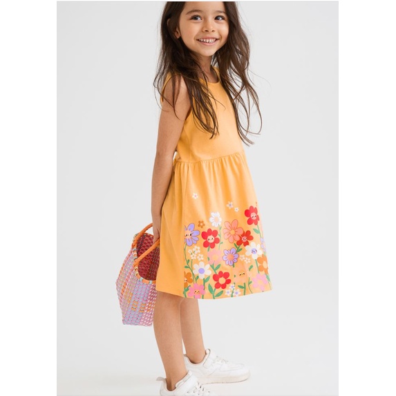 Đầm bé gái HM màu vàng cam hoa nhí size 2-10Y