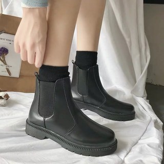 Giày bốt cao cổ đế bằng chất da