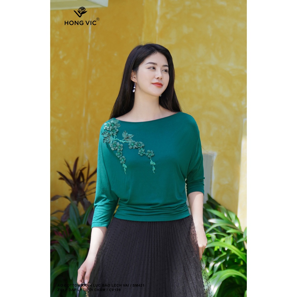 Áo nữ thiết kế Hong Vic cotton xanh lục bảo lệch vai SM421