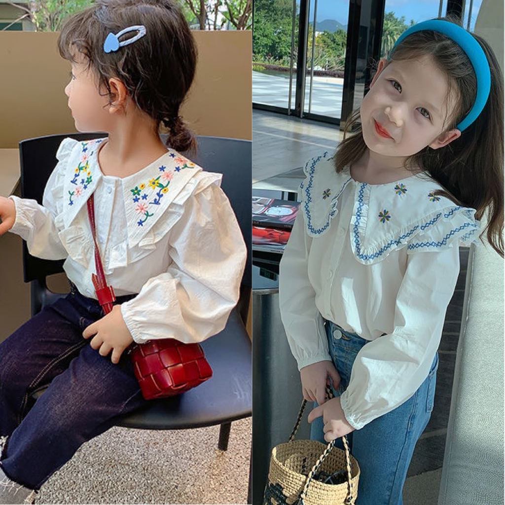 Áo sơ mi trắng dài tay rộng cổ thêu hoa cho bé gái (Nặng 10-35kg, cao 90-150cm). Mã hàng: NK0112