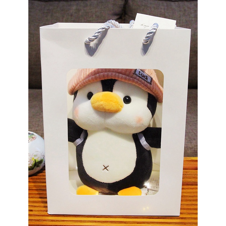 Gấu bông chim cánh cụt đội mũ đeo balo quà tặng sinh nhật gấu bông cho bé _ Unishop