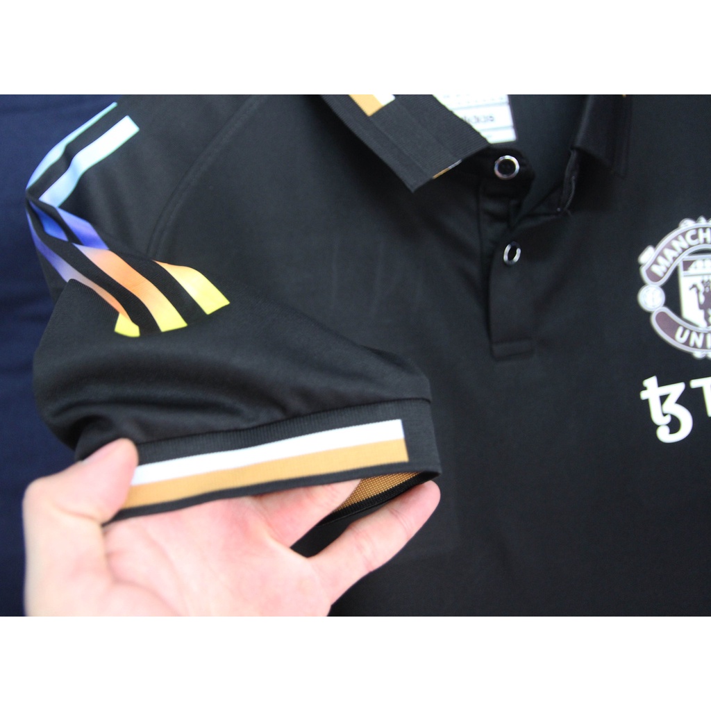 Áo polo MU Đen Sắc Màu 2022-2023