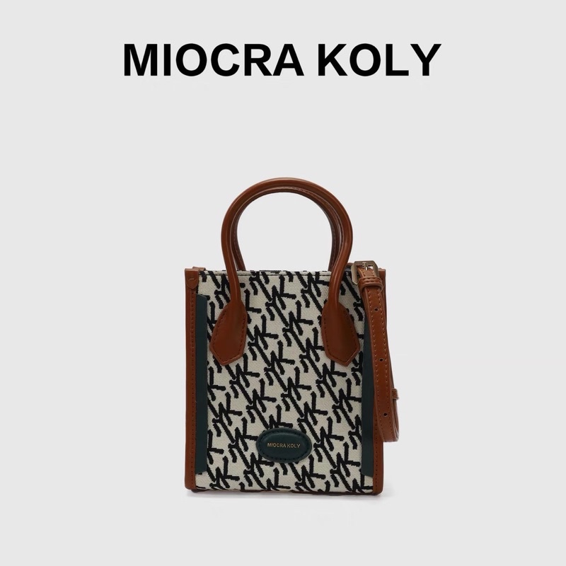 Túi 𝐌𝐢𝐨𝐜𝐫𝐚 𝐤𝐨𝐥𝐲 nền logo