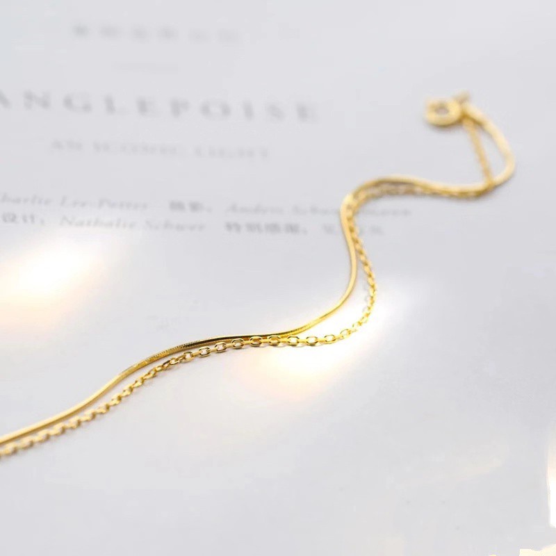Vòng tay / lắc chân hai lớp bằng thép titan mạ vàng 18K siêu mịn hình xương rắn đơn giản dễ phối đồ phong cách Hàn Quốc
