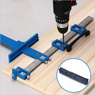 Thước định vị lỗ khoan xanh.