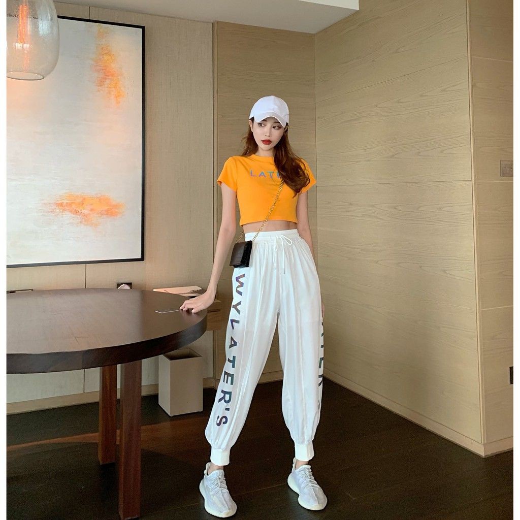 Set áo croptop tay ngắn cổ tròn màu cam phát sáng dạ quang+quần dài trắng thể thao lưng thun phát sáng ulzzang(có riêng)