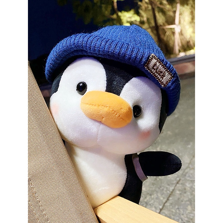 Gấu bông chim cánh cụt đội mũ đeo balo quà tặng sinh nhật gấu bông cho bé _ Unishop