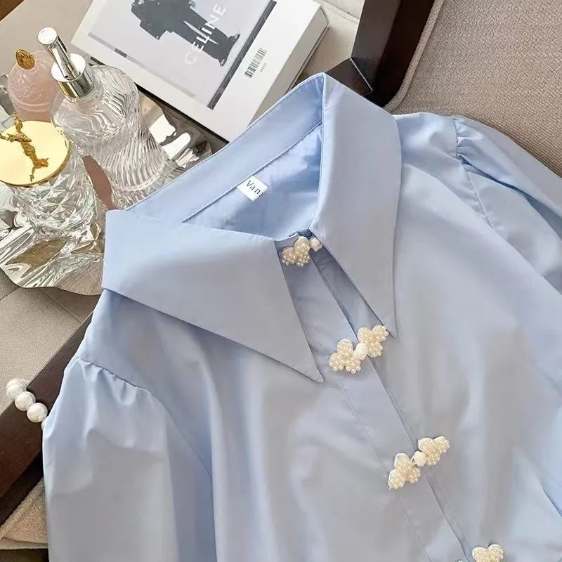 Áo Sơ Mi Ngắn Tay Phồng Đính Nút Ngọc Trai Thời Trang Mùa Hè Phong Cách Mới Cho Nữ