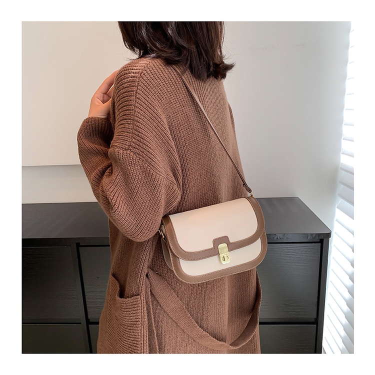 Túi xách nữ đeo chéo phong cách nữ tính thanh lịch khóa xoay có hai màu đen và trắng nâu