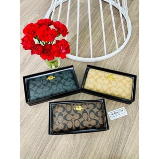 Ví cầm tay Coach dáng dài