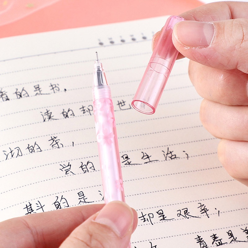 Bút Bi Mực Đen Ngòi 0.5mm Thiết Kế Tai Thỏ Đính Kim Sa Lấp Lánh Dễ Thương