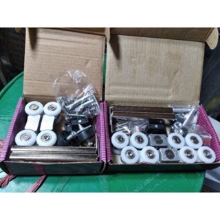 bánh xe treo con trượt cửa lùa nhôm 4 bánh và 8 bánh chất lượng