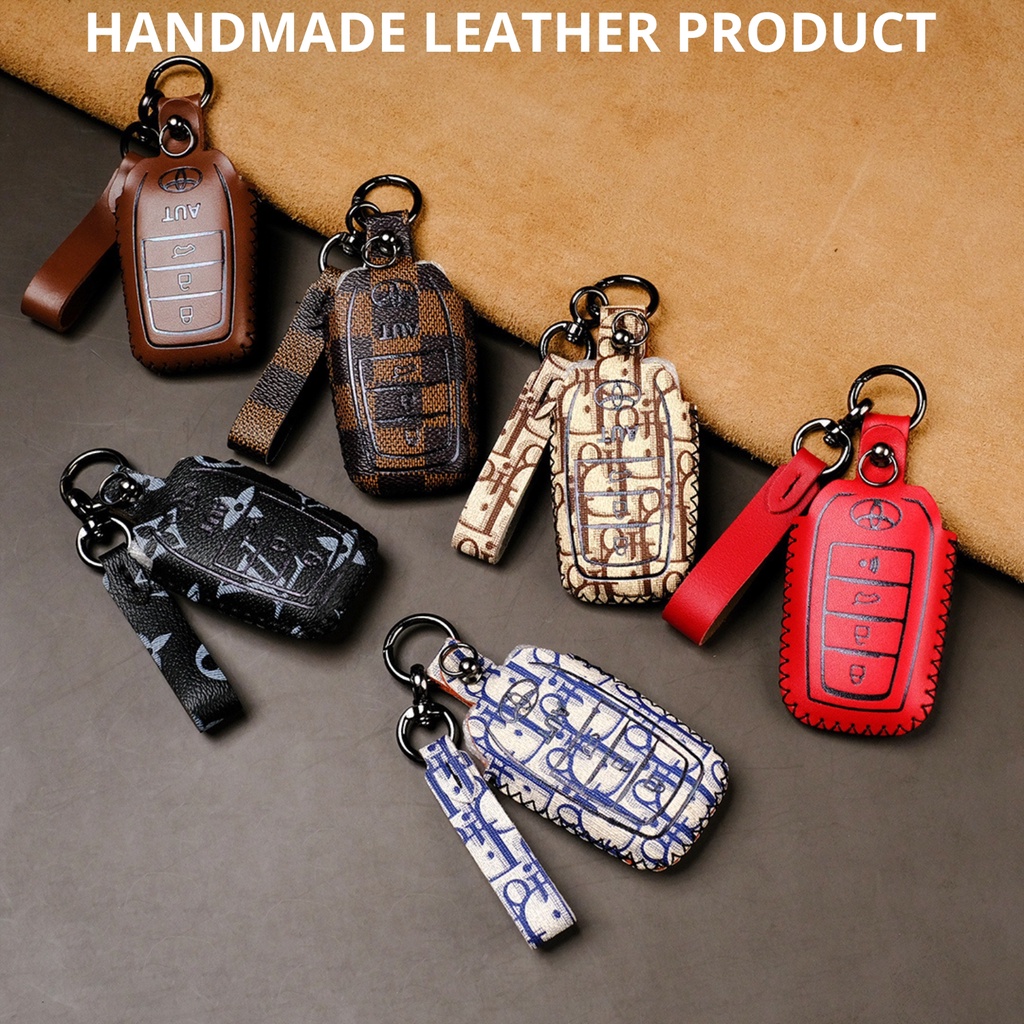 Bao da bọc chìa khóa smartkey ô tô Toyota Camry Fortuner Innova Hilux Land Cruiser mẫu mới khâu tay móc đen TFO