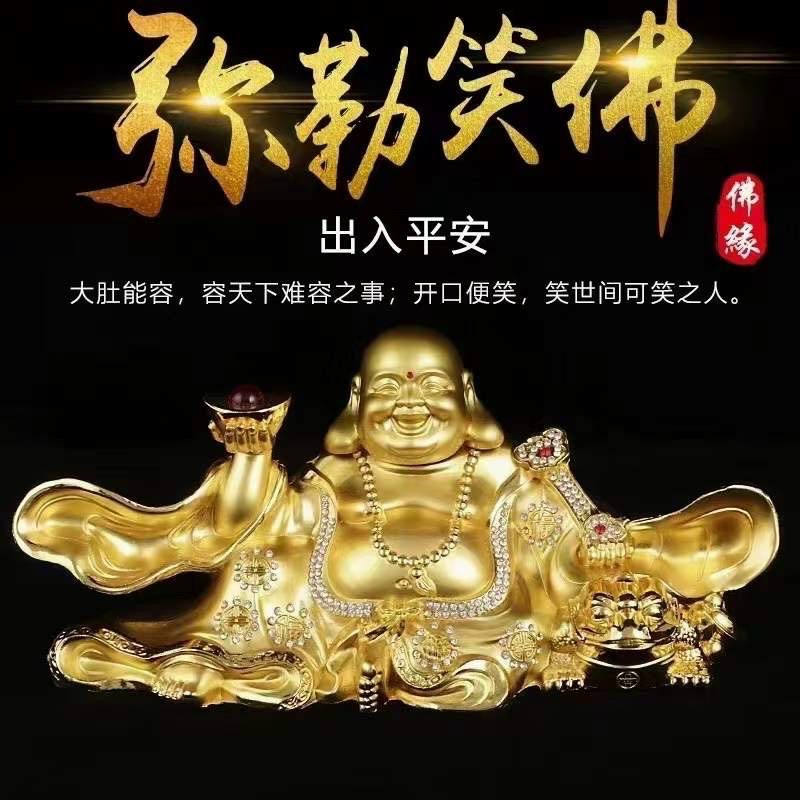 Tượng phật di lạc mạ vàng lắc đầu cầm thỏi vàng đĩa vàng để taplo xe hơi