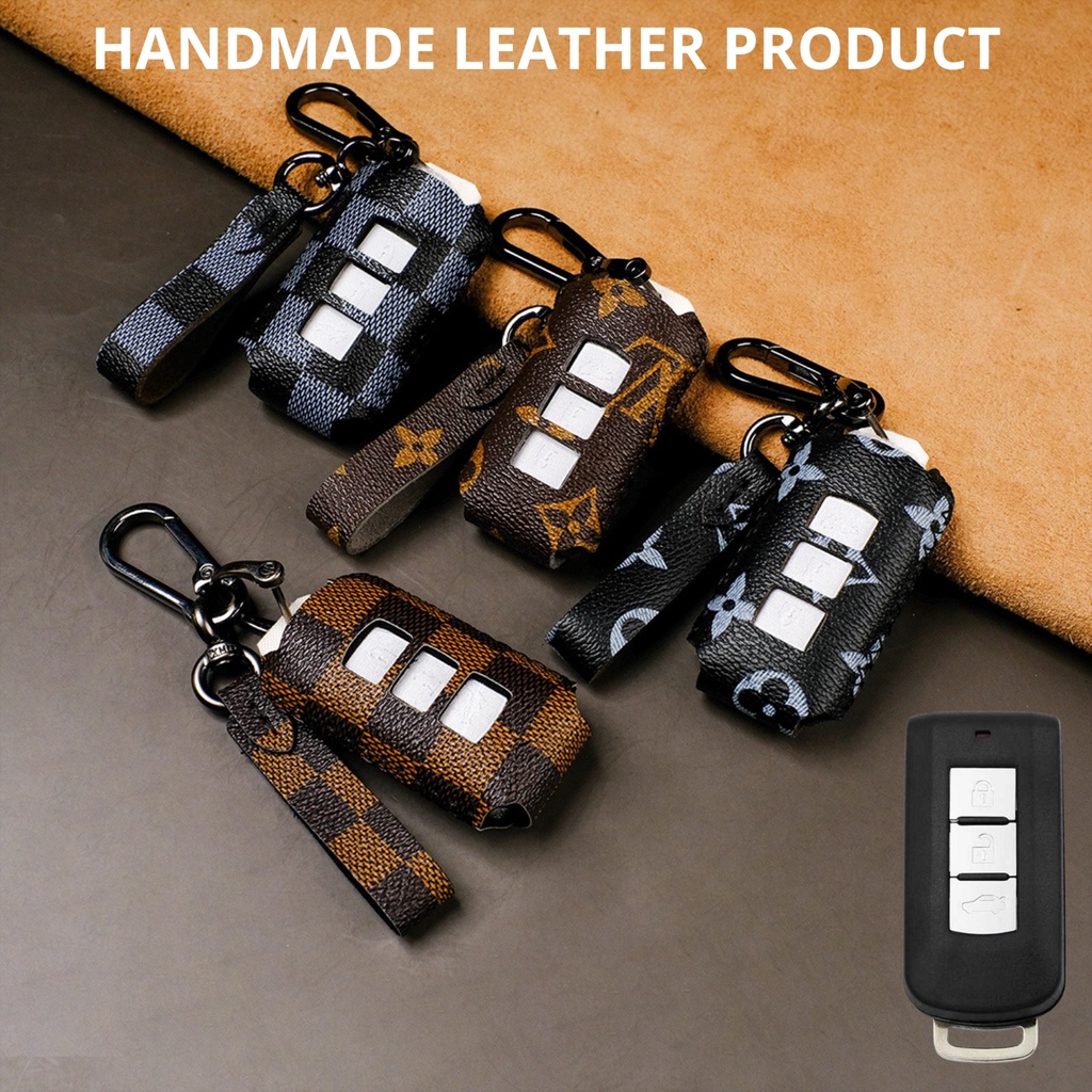 Bao da bọc chìa khóa smartkey ô tô Mitsubishi Xpander Triton Athlete Outlander Pajero Attrage 2022 khâu tay móc đen MI