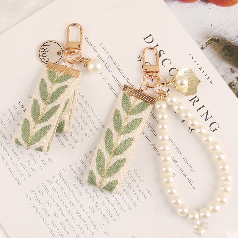 Móc Chìa Khóa Xe Hơi Bằng Hợp Kim Họa Tiết Kẻ Sọc Đính Ngọc Trai Và Ruy Băng Mới