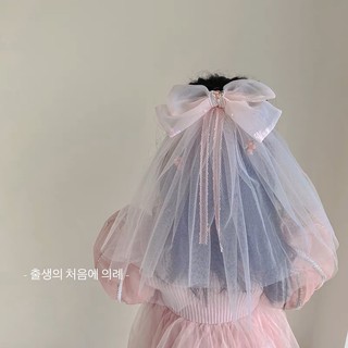 Kẹp nơ voan hoa thêu đuôi voan dài cho bé