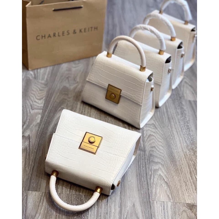 Túi xuất dư CNk khóa tròn quai xách siêu xinh