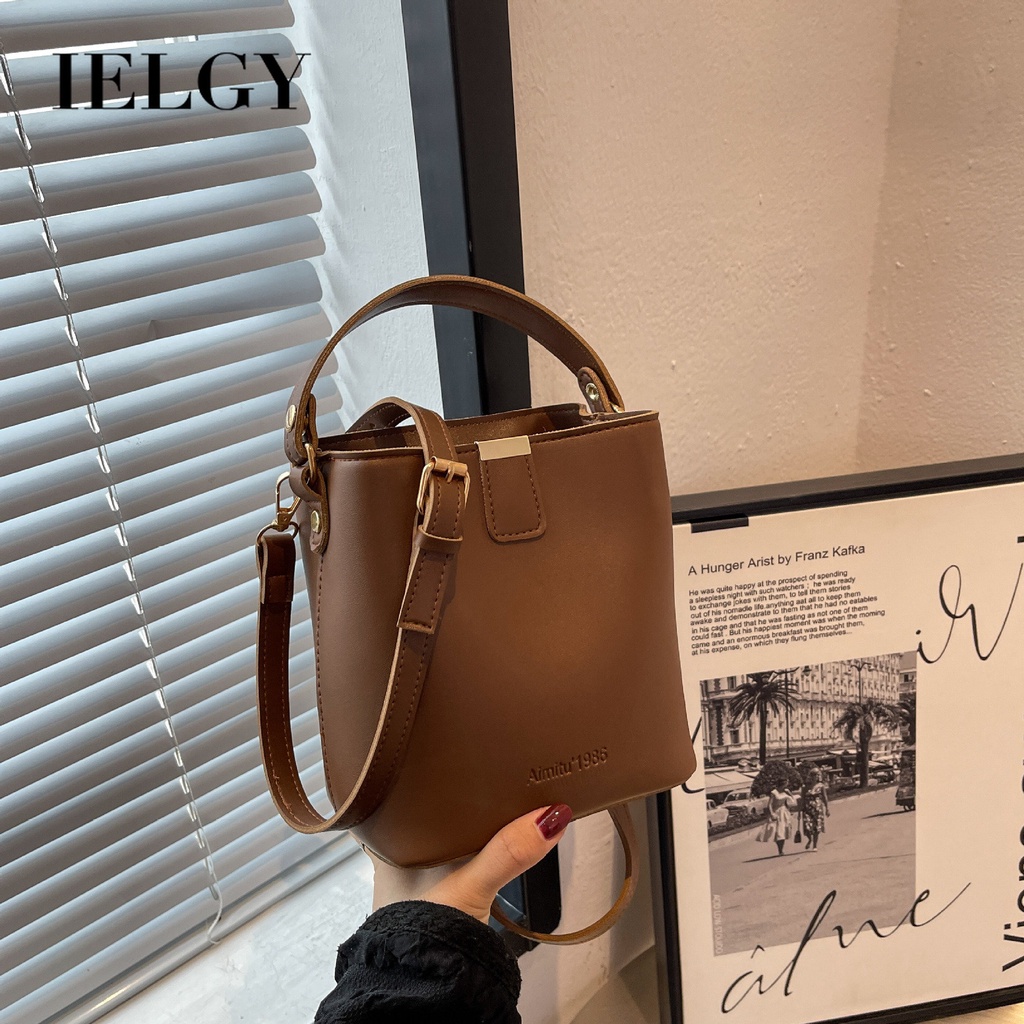 Túi Xách Cầm Tay Màu Trơn Phong Cách Phương Tây Thời Trang Mùa Xuân 2023 Mới Cho Nữ