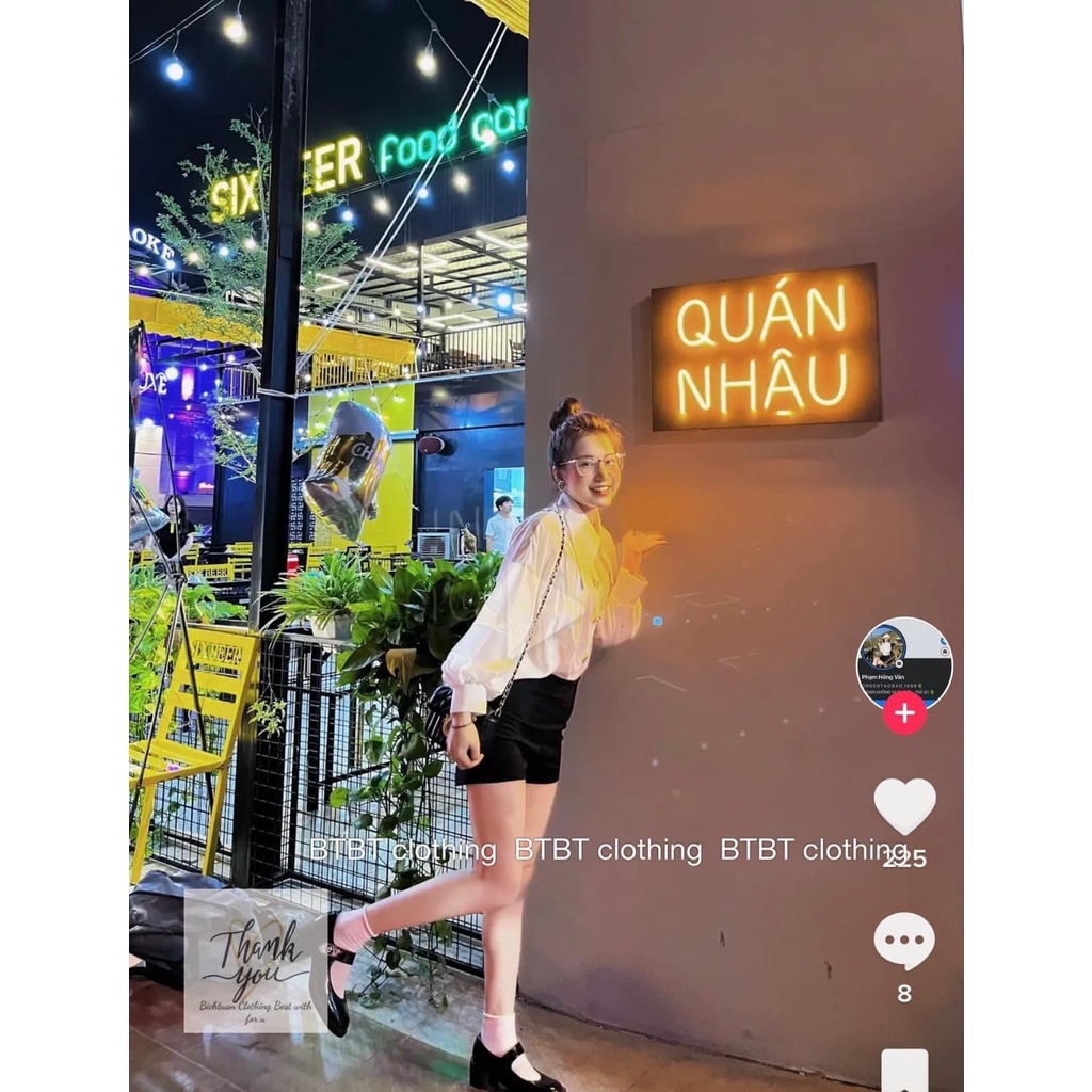 Áo sơ mi trắng cổ nhọn cúc to