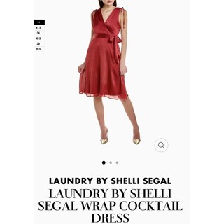 Đầm lụa xanh Laundry