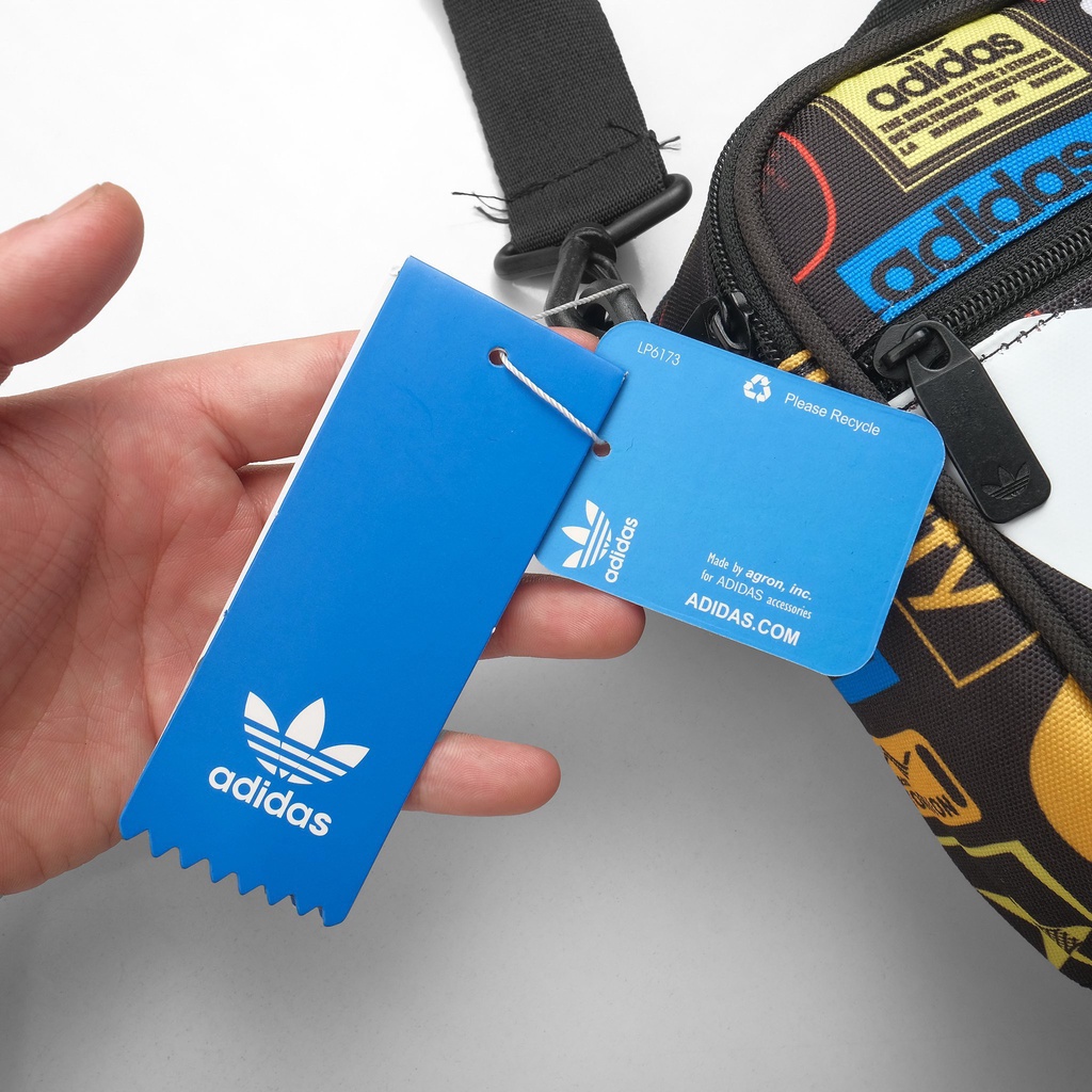 Túi đeo chéo form ngang  họa tiết logo cá tính, chất liệu chống thấm AD005