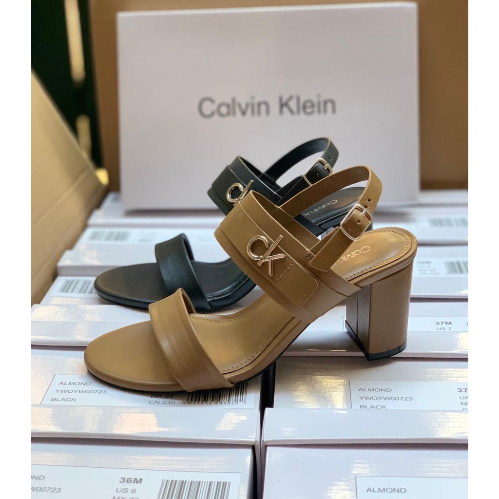 Sandal C.K quai ngang đính logo, gót trụ 7cm