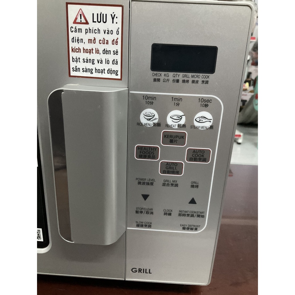 Lò vi sóng có nướng Sharp R-678VN 20 lít Thái Lan - Hàng trưng bày