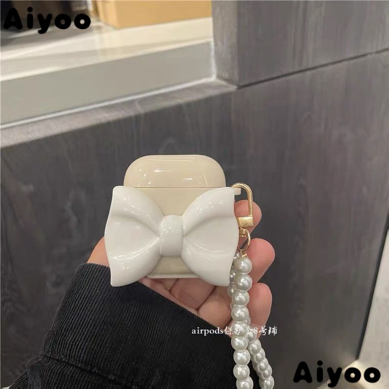 Vỏ Bảo Vệ Hộp Sạc Tai Nghe Bluetooth airpods2 airpods1airpods233 MN6A Màu Be Họa Tiết Hoạt Hình Thắt Nơ To Dễ Thương