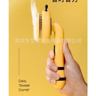 Lược chải lông cho chó mèo có nút bấm